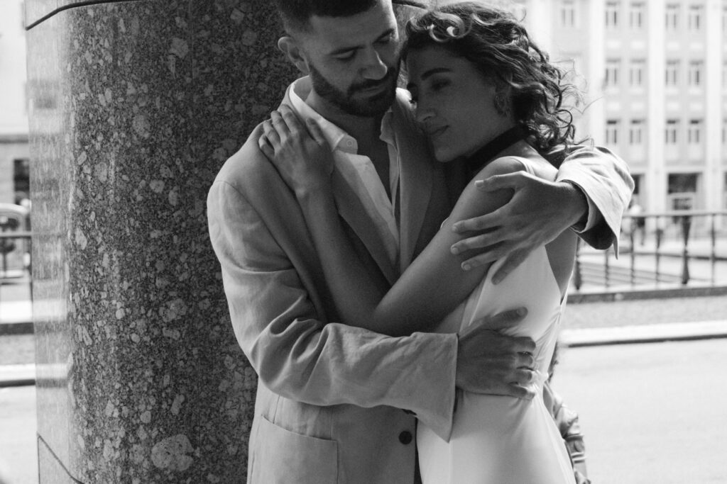 destination wedding photographer Porto Portugal couple embracing black and white emotional portrait