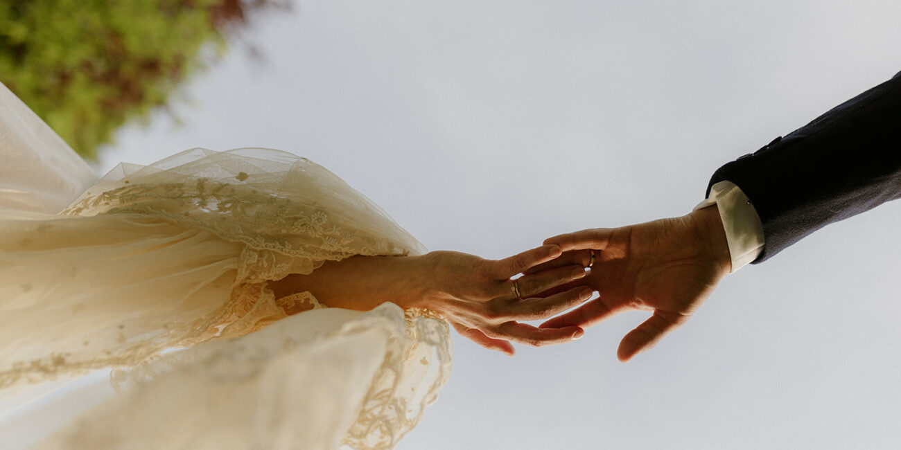 Intimate wedding moment between bride and groom in France captured by destination wedding photographer